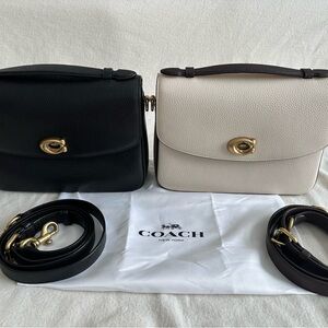 Coach Black and Cream Crossbody Bags